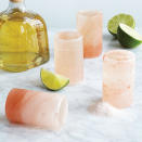 <p>For those days when a hefty toast is needed, test out these shot glasses made of Himalayan pink salt. They're naturally antibacterial and tough enough for several toasts. </p><p>Buy it <a rel="nofollow noopener" href="http://click.linksynergy.com/fs-bin/click?id=93xLBvPhAeE&subid=0&offerid=458243.1&type=10&tmpid=319&RD_PARM1=http%253A%252F%252Fwww.uncommongoods.com%252Fproduct%252Fhimalayan-salt-tequila-glasses-set-of-4&u1=ISSPWORKAHOLICGIFTGUIDE" target="_blank" data-ylk="slk:here;elm:context_link;itc:0;sec:content-canvas" class="link ">here</a> for $28-$45.</p>