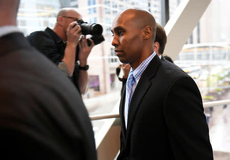 Mohamed Noor, former Minnesota policeman on trial for fatally shooting an Australian woman, walks into the courthouse in Minneapolis, Minnesota, U.S., April 30, 2019. REUTERS/Craig Lassig