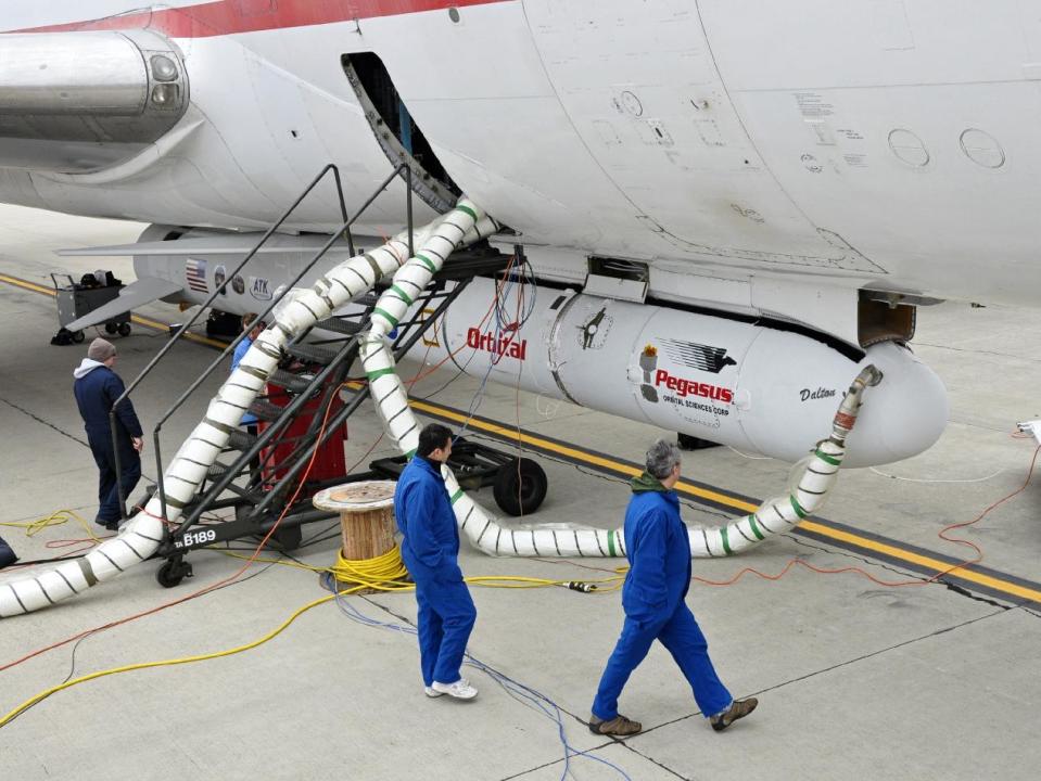 This undated photo provided by NASA shows the Orbital Sciences Corporation Pegasus XL rocket with the NuSTAR spacecraft after attachment to the L-1011 carrier aircraft known as "Stargazer." The Pegasus will launch NuSTAR into space, Wednesday June 13, 2012 where the high-energy X-ray telescope will conduct a census for black holes, map radioactive material in young supernovae remnants, and study the origins of cosmic rays and extreme physics around collapsed stars. (AP Photo/NASA, Randy Beaudoin)