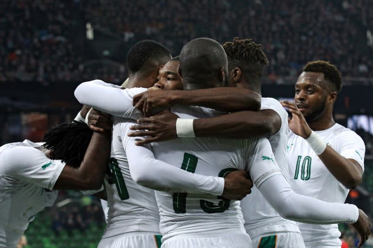 Ivory Coast's players celebrate a goal during their international friendly football match against Russia in Krasnodar on March 24, 2017