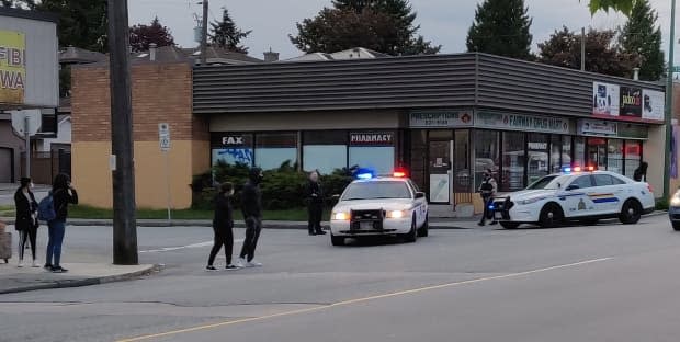 Police in Burnaby respond to a shooting at 12th Avenue and 6th Street on May 8, 2021. (Justin Correia - image credit)