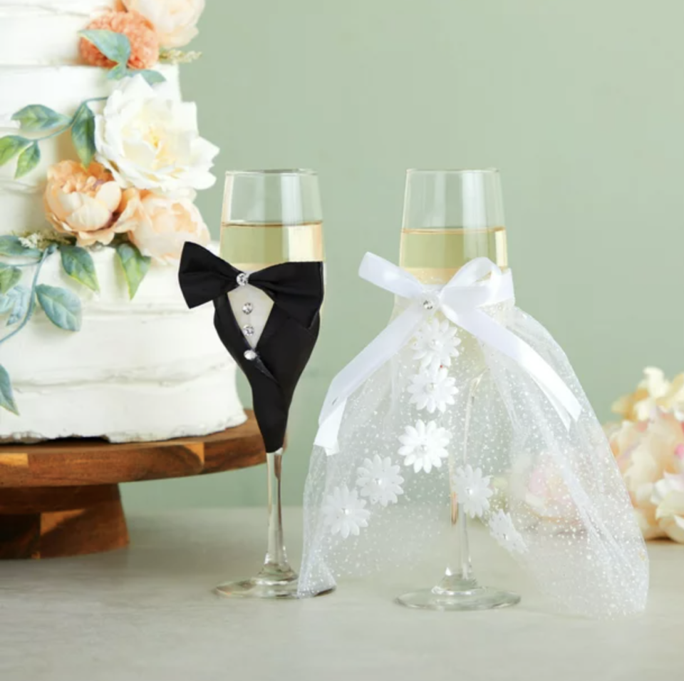 <p><a href="https://go.redirectingat.com?id=74968X1596630&url=https%3A%2F%2Fwww.walmart.com%2Fip%2FSet-of-2-Mr-Mrs-Wedding-Toasting-Glasses-Bride-and-Groom-Champagne-Flutes-in-Lace-Dress-and-Tuxedo-Wedding-Gift-Idea%2F236546866&sref=https%3A%2F%2Fwww.goodhousekeeping.com%2Fhome%2Fg283%2Fbridal-shower-gifts%2F" rel="nofollow noopener" target="_blank" data-ylk="slk:Shop Now;elm:context_link;itc:0;sec:content-canvas" class="link ">Shop Now</a></p><p>Mr. & Mrs. Wedding Toasting Glasses</p><p>walmart.com</p><p>$20.99</p>