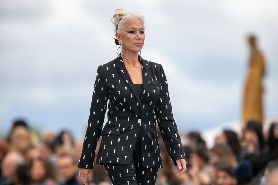 PARIS, FRANCE - OCTOBER 03: Actress Helen Mirren walks the runway during the 