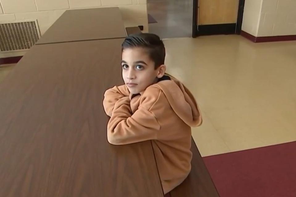 7-year-old Grayson Molina was saved by the aide after he started choking on a slice of pizza during lunch. NBC New York