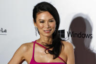 FILE - Chinese-born and U.S. businesswoman Wendi Deng Murdoch, ex-wife of Rupert Murdoch, poses on the red carpet for the fundraising gala organized by amfAR (The Foundation for AIDS Research) in Hong Kong. (AP Photo/Kin Cheung, File)