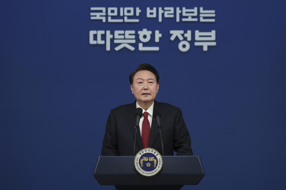 In this photo provided by South Korea Presidential Office, South Korean President Yoon Suk Yeol speaks during his New Year's speech at the presidential office in Seoul, South Korea, Monday, Jan. 1, 2024. (South Korea Presidential Office via AP)