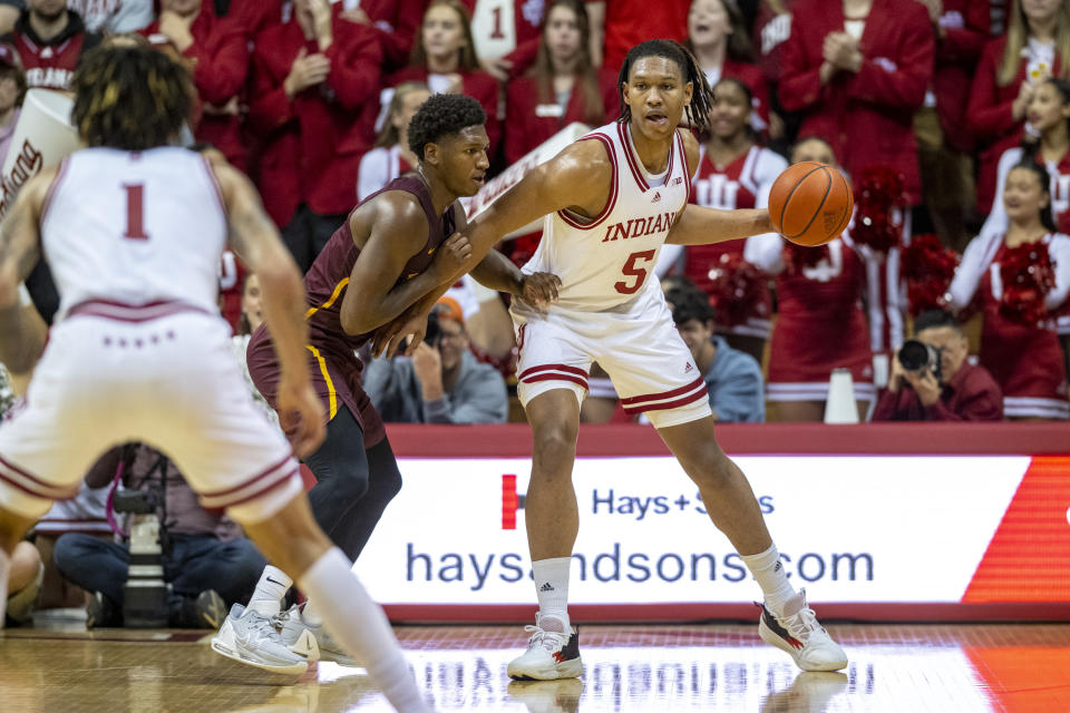 Indiana forward Malik Reneau, right, is defended by Bethune-Cookman guard Damani McEntire during the first half of an NCAA college basketball game Thursday, Nov. 10, 2022, in Bloomington, Ind. (AP Photo/Doug McSchooler)