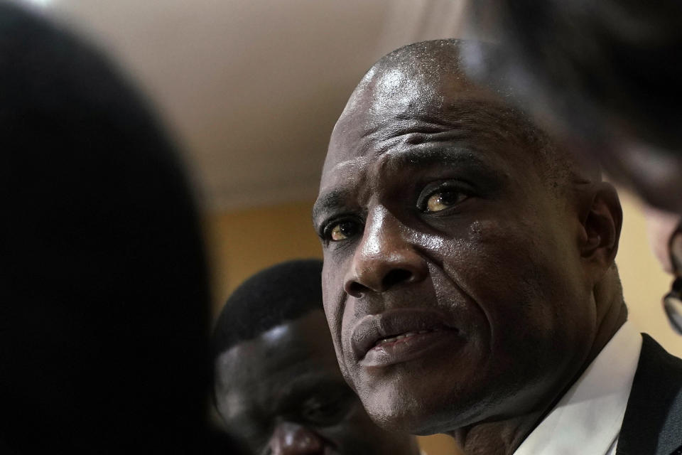 Congolese opposition presidential candidate Martin Fayulu delivers a statement at his headquarters in Kinshasa, Congo, Tuesday Jan. 8, 2019. As Congo anxiously awaits the outcome of the presidential election, many in the capital say they are convinced that the opposition won and that the delay in announcing results is allowing manipulation in favor of the ruling party. (AP Photo/Jerome Delay)