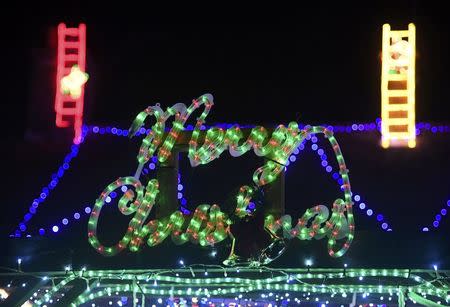 A home is decorated with a display of Christmas of lights in a tradition that has grown over recent years in the small village of Westfield in Sussex, south east England, December 15, 2016. Picture taken on December 15. REUTERS/Toby Melville