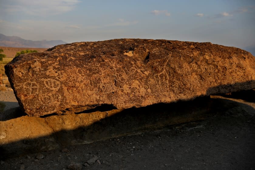 BISHOP, CA - JULY 12: Fish Slough Petroglyph site in the U.S. Bureau of Land Management's Volcanic Tablelands area on Monday, July 12, 2021 in Bishop, CA. Joseph Kirschvink, a professor of geoscience and faculty member, from the California Institute of Technology, known for its strength in science and engineering, had used a portable pneumatic drill to extract core samples for paleomagnetic studies. In the process, the site was riddled with 29, 1-inch diameter holes marked with blue paint. The area is located in the eastern Sierra Nevada range. Gary Coronado / Los Angeles Times)