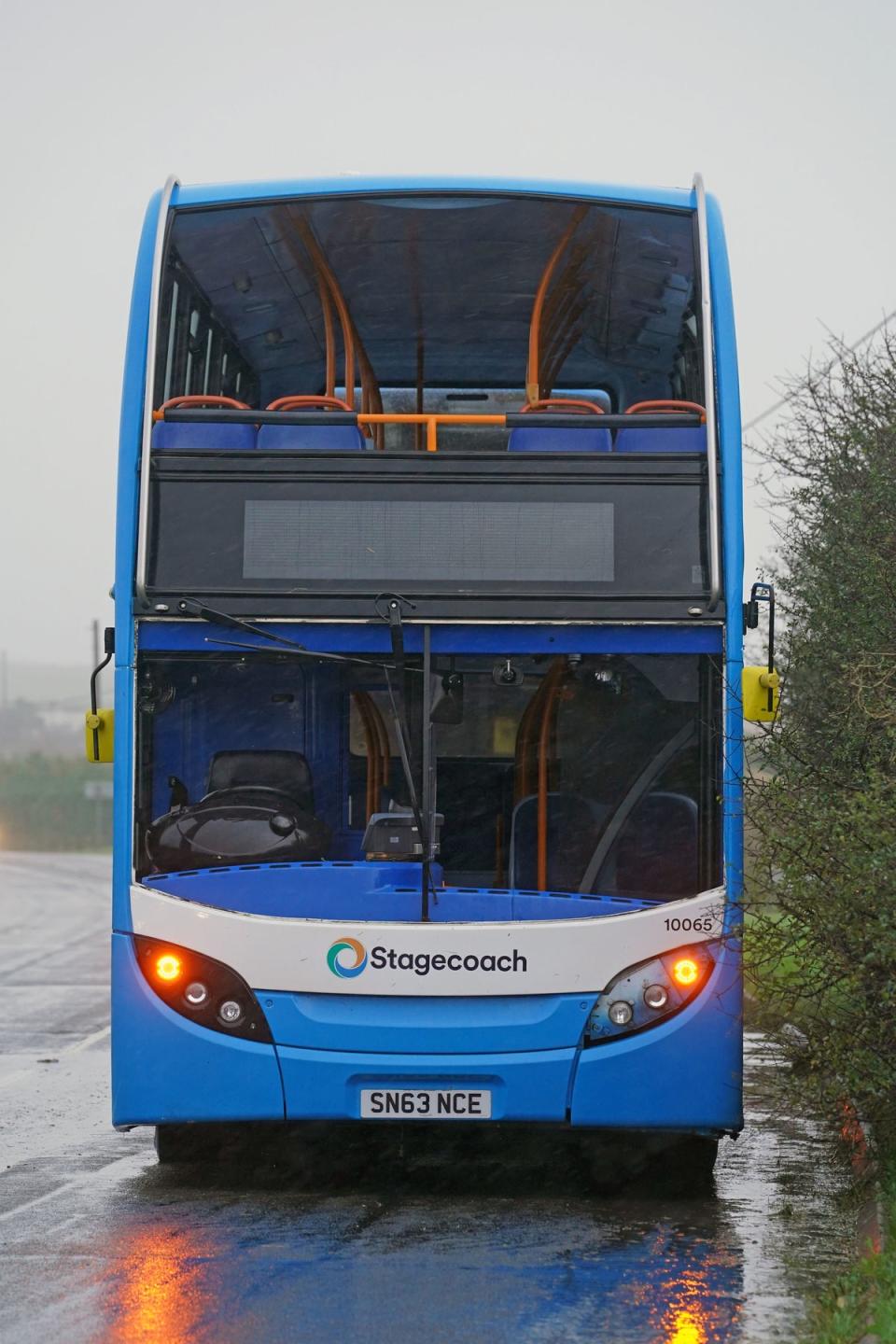 The front screen of a bus was blown out because of heavy winds (PA)