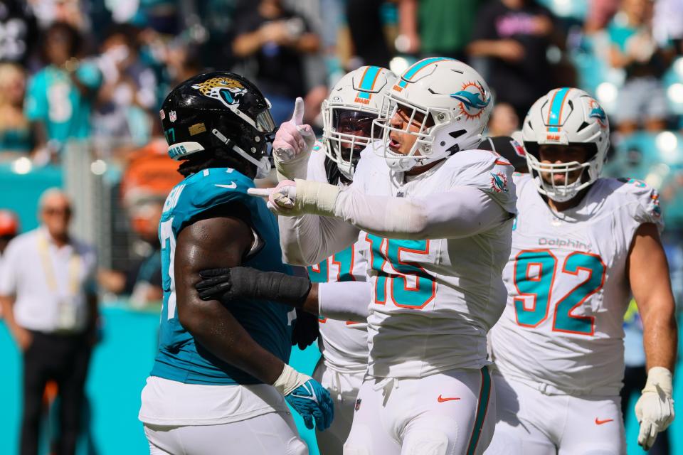 Sep 8, 2024; Miami Gardens, Florida, USA; Miami Dolphins linebacker Jaelan Phillips (15) celebrates after sacking Jacksonville Jaguars quarterback Trevor Lawrence (not pictured) during the fourth quarter at Hard Rock Stadium. Mandatory Credit: Sam Navarro-Imagn Images