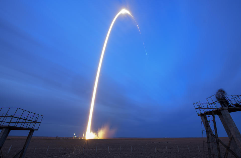 In this image taken with a slow shutter speed and released by NASA, the Soyuz MS-15 spaceship carrying a new crew to the International Space Station (ISS) streaks into the sky during liftoff at the Russian leased Baikonur cosmodrome, Kazakhstan, early Wednesday, Sept. 25, 2019. The Russian rocket carries U.S. astronaut Jessica Meir, Russian cosmonaut Oleg Skripochka, and United Arab Emirates astronaut Hazza Almansoori. (Bill Ingalls