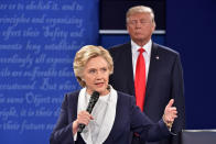 <p>Donald Trump listens to Democratic presidential candidate Hillary Clinton during the second presidential debate at Washington University in St. Louis, Mo., on Oct. 9, 2016. (Photo: Paul J. Richards/AFP/Getty Images) </p>