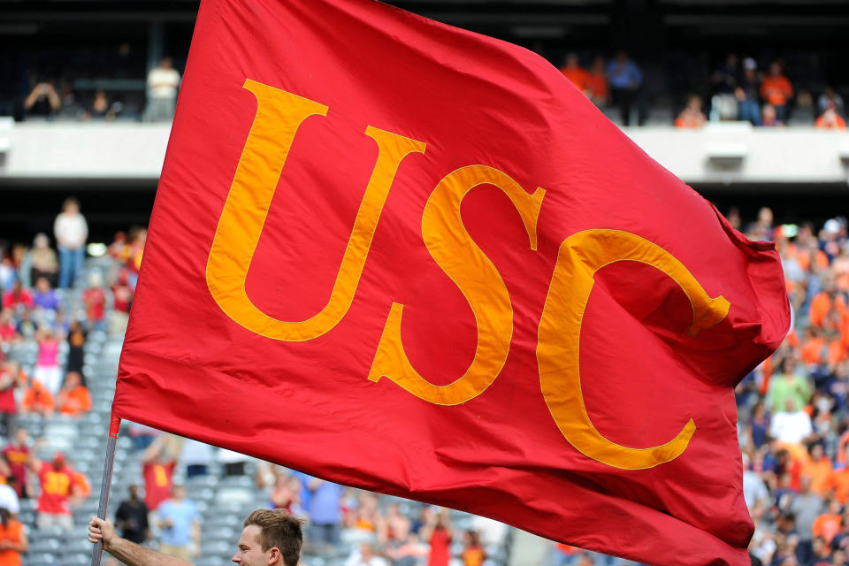 Sep 8, 2012; East Rutherford, NJ, USA; USC Trojans flag is carried on the field prior to the start of the game against the Syracuse Orange at MetLife Stadium. Mandatory Credit: Rich Barnes-USA TODAY Sports