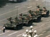 <p>In 1989, an unknown man stood in front of a column of tanks in Tiananmen Square in China. The picture, taken the day after the bloody Tiananmen Square massacre, became a symbol of non-violent resistance. The ‘Tank Man’ was never identified, but graced the covers of newspapers across the world. (AP) </p>