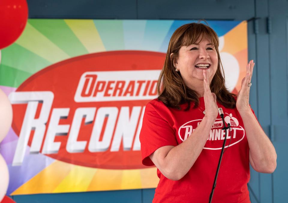 Austin school Superintendent Stephanie S. Elizalde applauds the teachers, faculty and volunteers attending the district's Operation Reconnect block walk in June 2021, an effort to enroll students amid the pandemic.