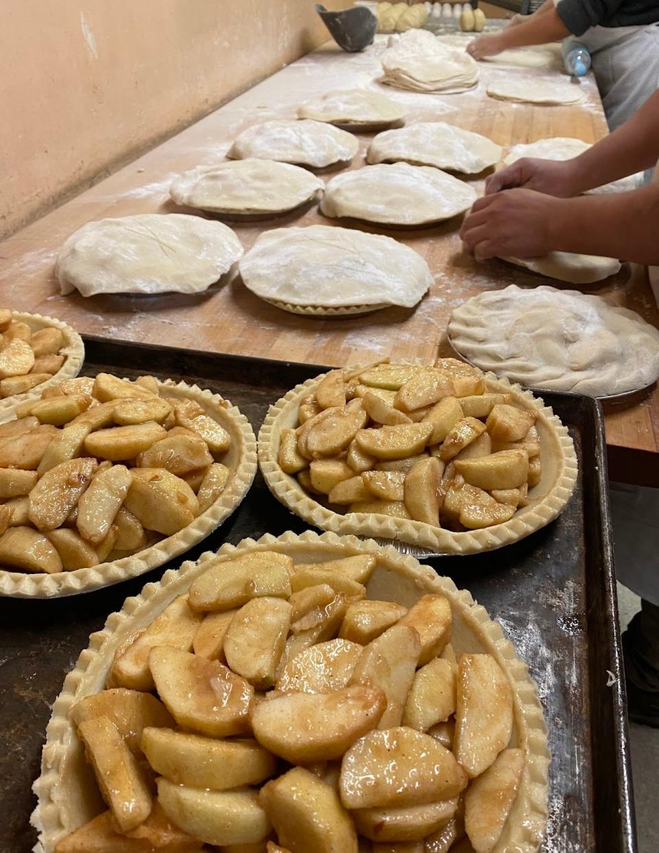 Fresh apple pies being prepared for baking at Wemrock Orchards in Freehold Township.