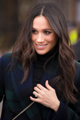 <p>On Feb. 13, Meghan joined Prince Harry on their debut joint trip to Edinburgh to greet flag-bearing crowds. For the occasion, she opted for her now-famous brushed-out waves. (Photo: Getty Images) </p>