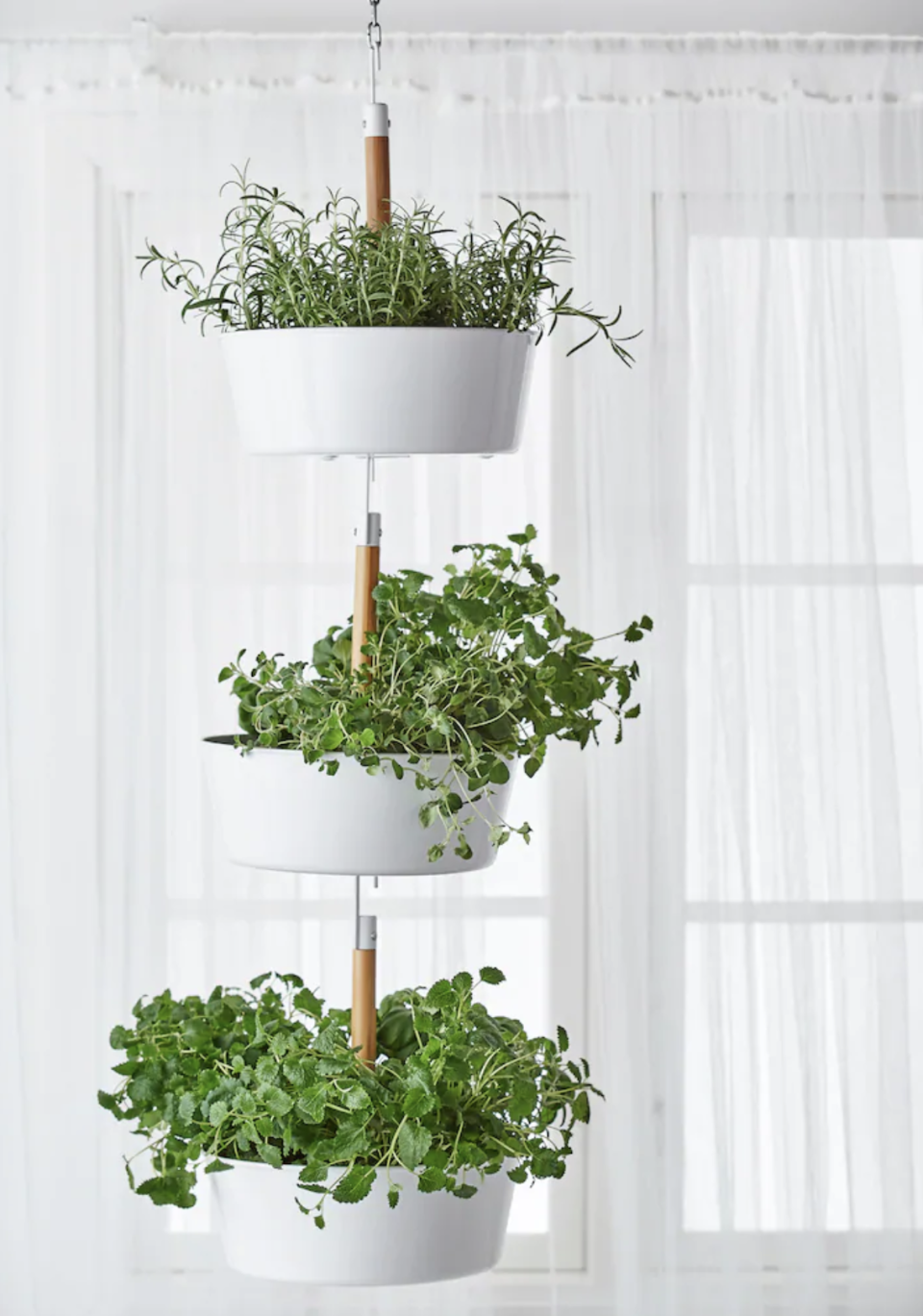 <p> Vertical and indoor gardening go hand in hand so don&apos;t feel limited to just using your outdoor space. Grow herbs upwards for a cute and tasty display no matter where you hang this little masterpiece. </p>