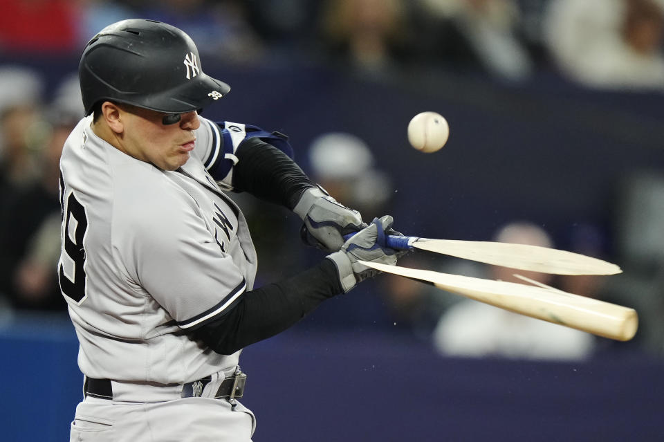 New York Yankees' Jose Trevino breaks his bat on a groundout against the Toronto Blue Jays during the seventh inning of a baseball game Wednesday, May 17, 2023, in Toronto. (Frank Gunn/The Canadian Press via AP)