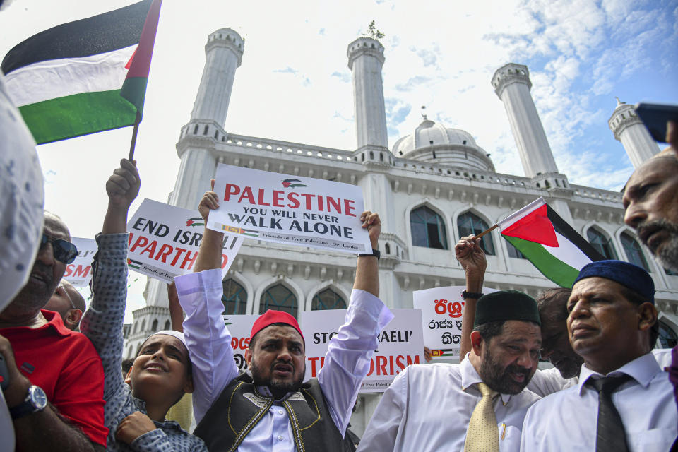 Sri Lankan Muslims participate in a protest against Israeli airstrikes on Gaza and to show solidarity with Palestinian people, in Colombo, Sri Lanka, Friday, Oct. 13, 2023. (AP Photo)