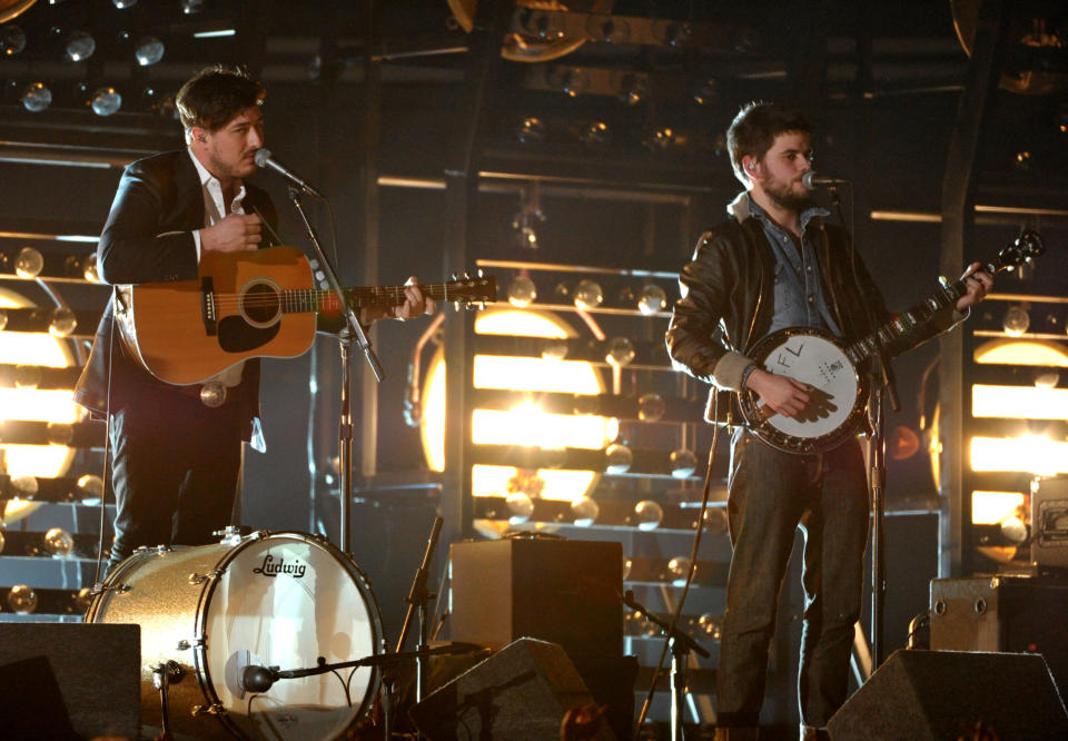 Marcus Mumford, left, and Winston Marshall, of musical group Mumford & Sons, perform at the 55th annual Grammy Awards on Sunday, Feb. 10, 2013, in Los Angeles. (Photo by John Shearer/Invision/AP)