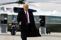 President Donald Trump boards Air Force One from Andrews Air Force Base, Md., Friday Feb. 28, 2020, en route to North Charleston, S.C., for a campaign rally. (AP Photo/Jacquelyn Martin)