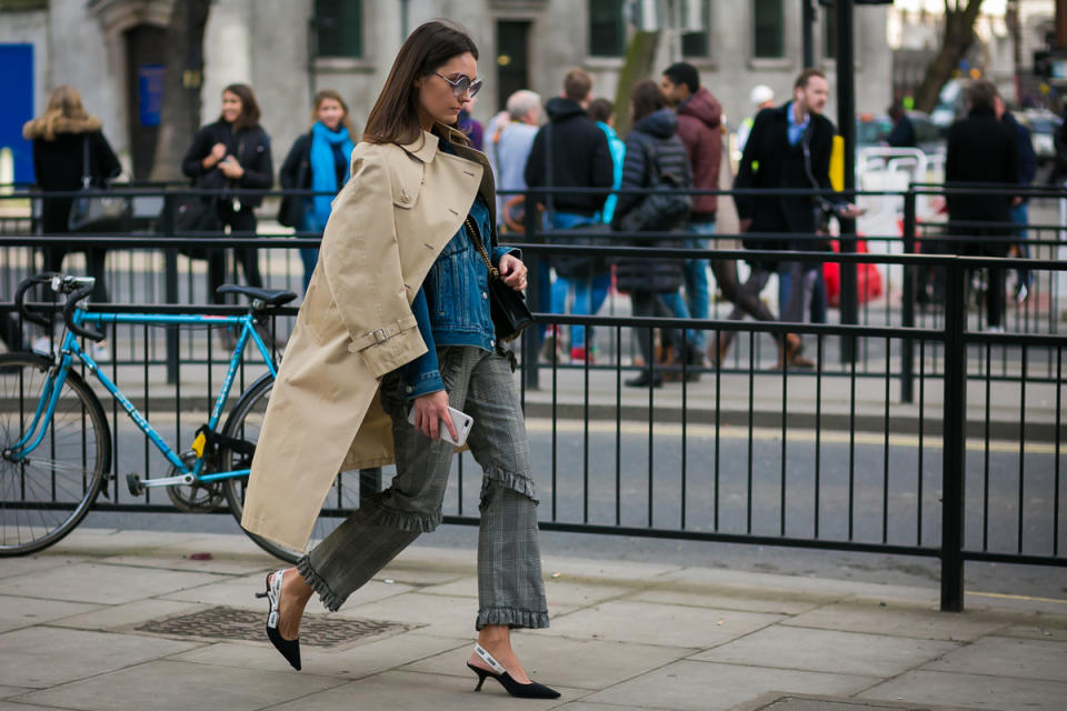 A show-goer at Eudon Choi combines two of the fashion pack’s favorite trends: ruffles and kitten heels.