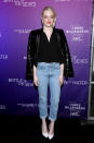<p>Later in the day Stone went for a toned-down, but still chic, look for a Fox Searchlight party. She combined the same white shoes with boyfriend jeans, a black top and an embellished blazer. </p>