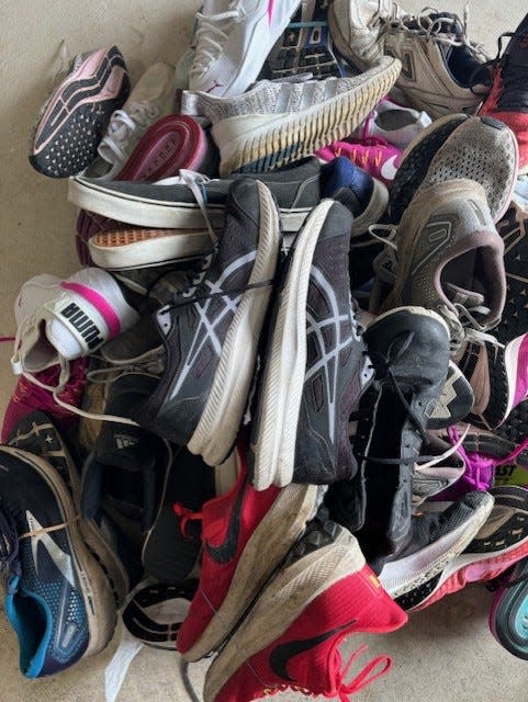 Some of the used sneakers already collected by the Monroe Exchange Club are shown. Shoes can be dropped-off at Paula's House though April 15.