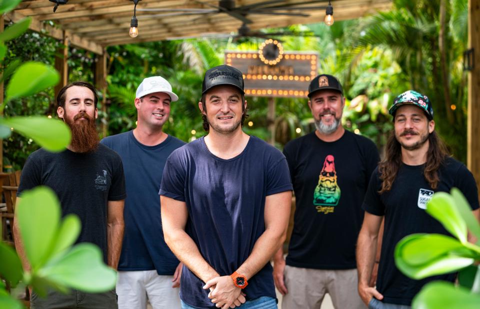 From left: Spencer Paterson, Alex Casement, Eddie Kopp, Arian Antonucci and Justin Kaczmarek pose at the Sugarshack in Bonita Springs on Thursday, July 27, 2023.