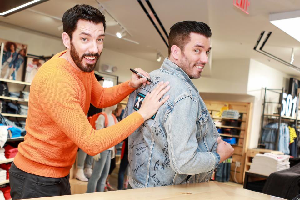 Jonathan Scott and Drew Scott goof off on Tuesday at The Levi's Store Times Square in N.Y.C.