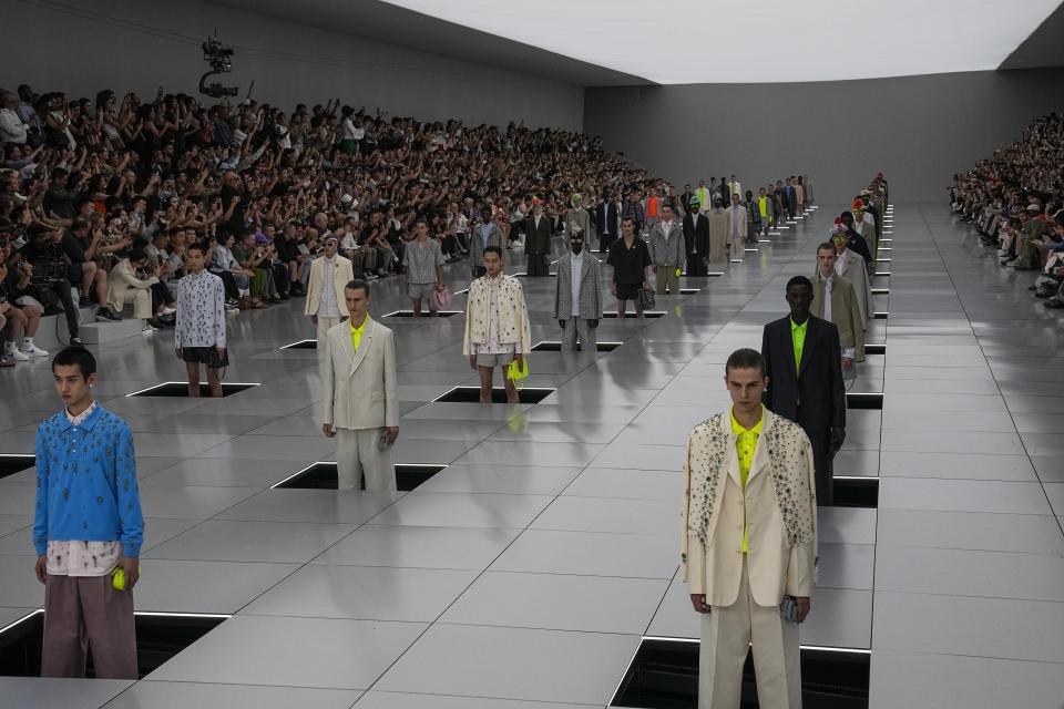 Models wear creations for the Dior Menswear Spring/Summer 2024 fashion collection presented in Paris, Friday, June 23, 2023. (AP Photo/Michel Euler)