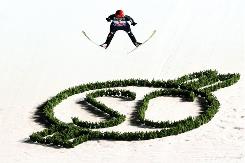 German ski jumper Karl Geiger in action during the men's Four Hills Tournament large hill 1st round of the Ski Jumping World Cup in Oberstdorf. Daniel Karmann/dpa