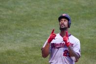 Minnesota Twins' Byron Buxton celebrates after hitting a home run during the fifth inning of a baseball game against the Milwaukee Brewers Wednesday, Aug. 12, 2020, in Milwaukee. (AP Photo/Morry Gash)