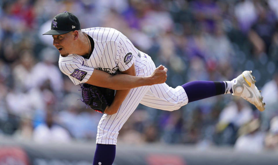 Colorado Rockies relief pitcher Robert Stephenson works against the Philadelphia Phillies in the eighth inning of a baseball game Sunday, April 25, 2021, in Denver. (AP Photo/David Zalubowski)