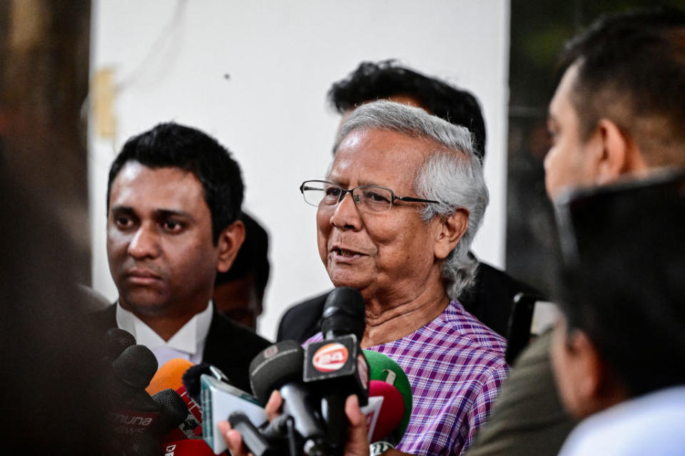 Muhammad Yunus speaks to media after filing an appeal for to extend his bail at the Labour Appellate Tribunal in Dhaka on May 23, 2024. <br><span class="copyright">Munir Uz Zaman—AFP/Getty Images</span>