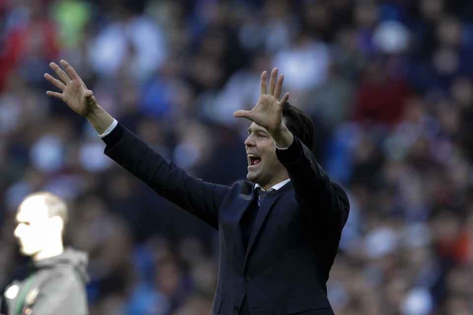 Real Madrid's head coach Santiago Solari shouts instructions during a La Liga soccer match between Real Madrid and Girona at the Bernabeu stadium in Madrid, Spain, Sunday, Feb. 17, 2019. (AP Photo/Andrea Comas)