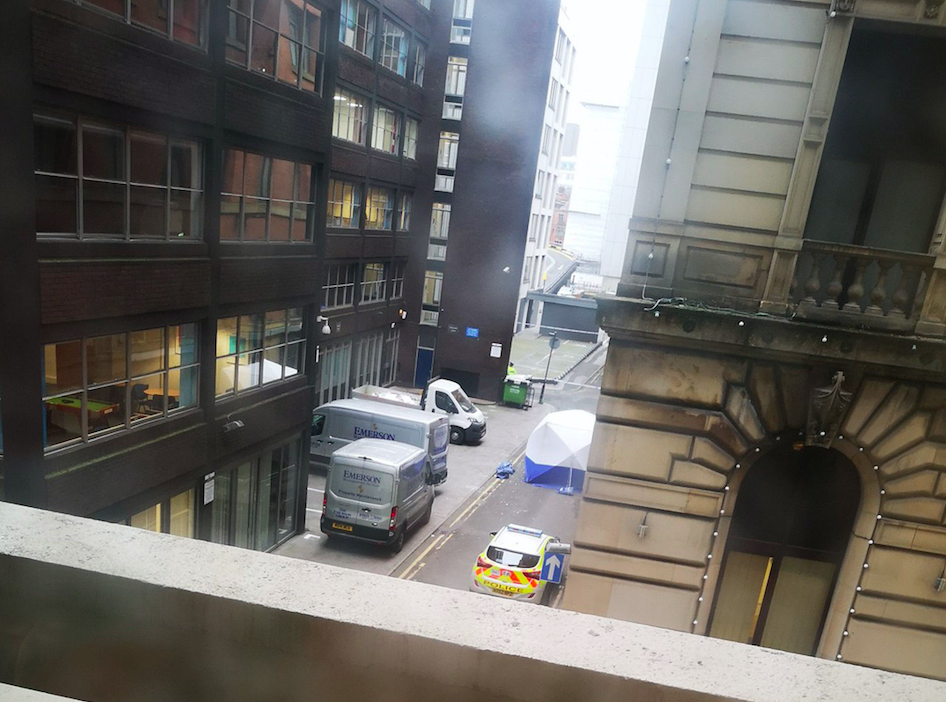 <em>A police forensic tent in Manchester city centre was set up after two men were found dead (Twitter/@Whammertime2/PA)</em>