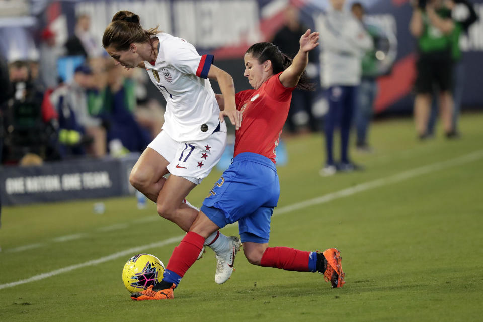Costa Rica defender Lixy Rodriguez, right, tries to get possession of the ball from U.S. forward Tobin Heath (17) during the first half of an international friendly soccer match Sunday, Nov. 10, 2019, in Jacksonville, Fla. (AP Photo/John Raoux)