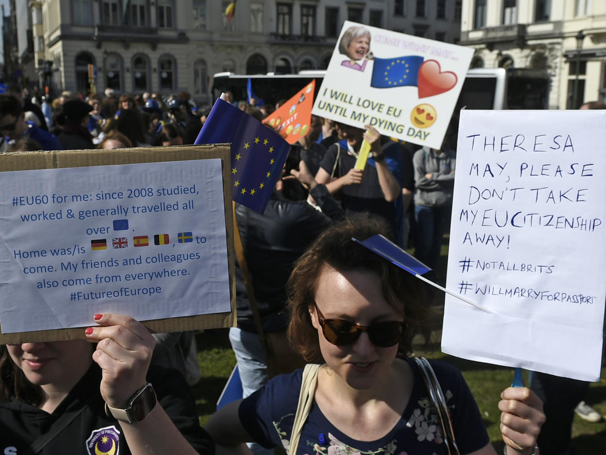 A lost cause? Pro-EU protester holds up placard against Brexit in Rome ahead of 60th anniversary celebrations: John Thys/AFP/Getty Images