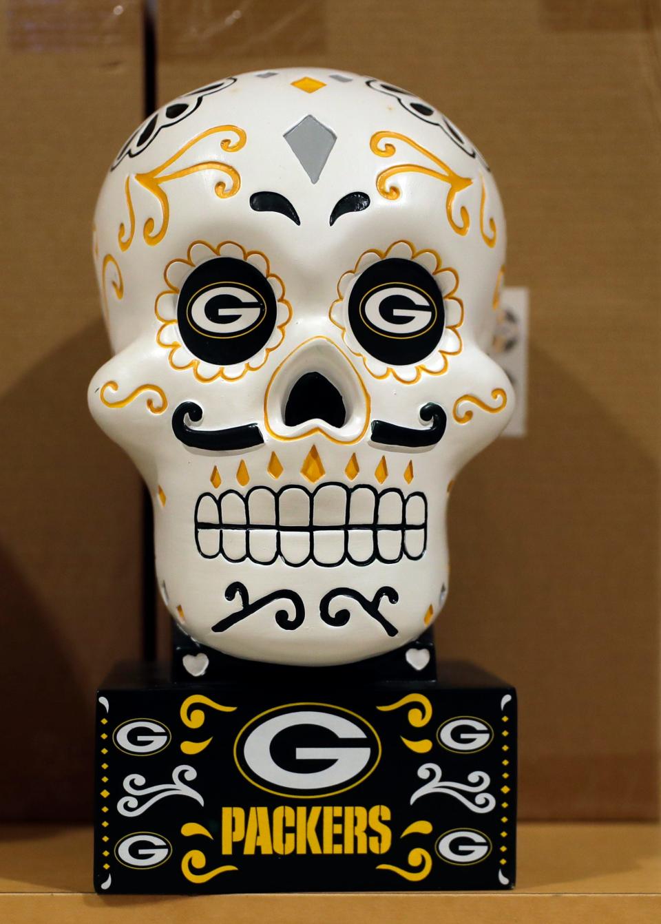 A Día de los Muertos Green Bay Packers skull for sale at the Packers Pro Shop on Jan. 17, 2023, in Green Bay, Wis.