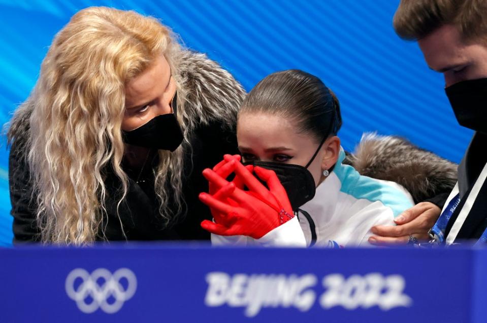 Kamila Valieva of Russian Olympic Committee cries next her coach Eteri Tutberidze (EPA)