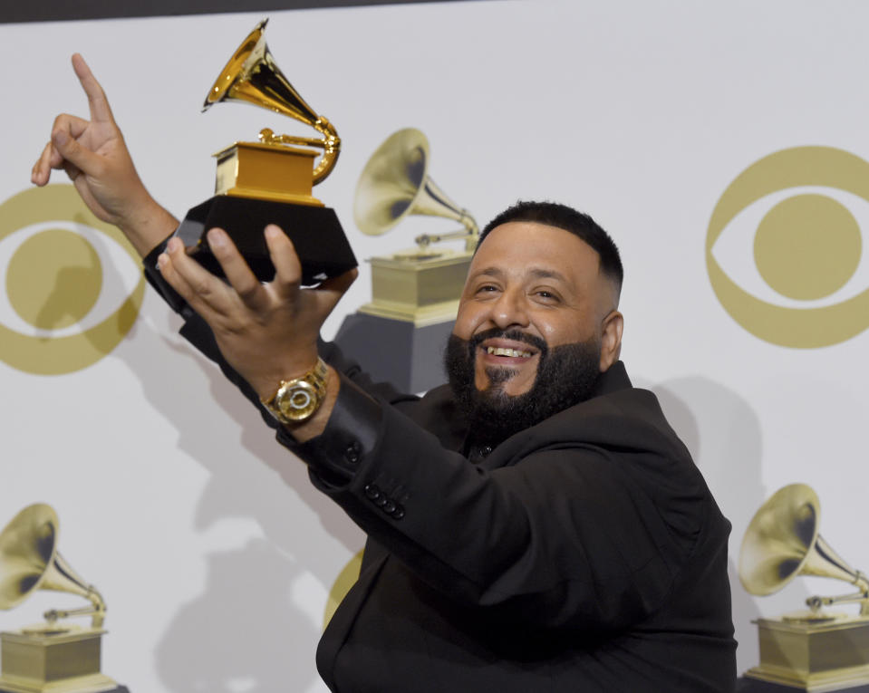 DJ Khaled poses in the press room with the award for best rap/sung performance for "Higher" at the 62nd annual Grammy Awards at the Staples Center on Sunday, Jan. 26, 2020, in Los Angeles. (AP Photo/Chris Pizzello)