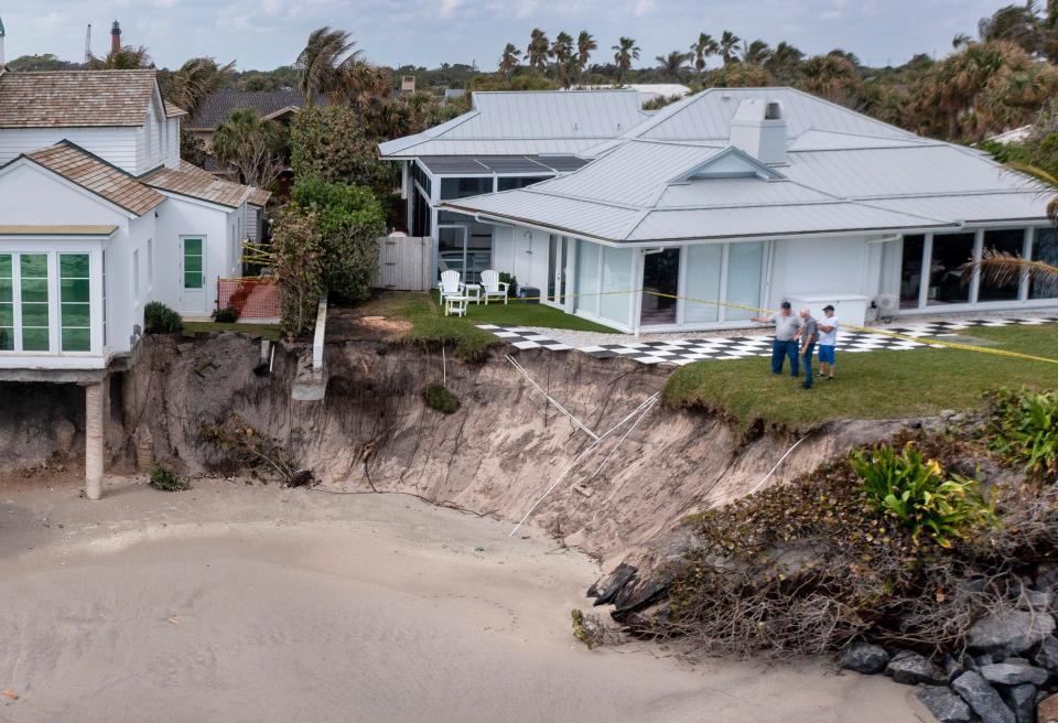 The home of Kid Rock, right, whose legal name is Robert J. Ritchie, was damaged by erosion on February 12, 2024, in Jupiter Inlet Colony, Florida.