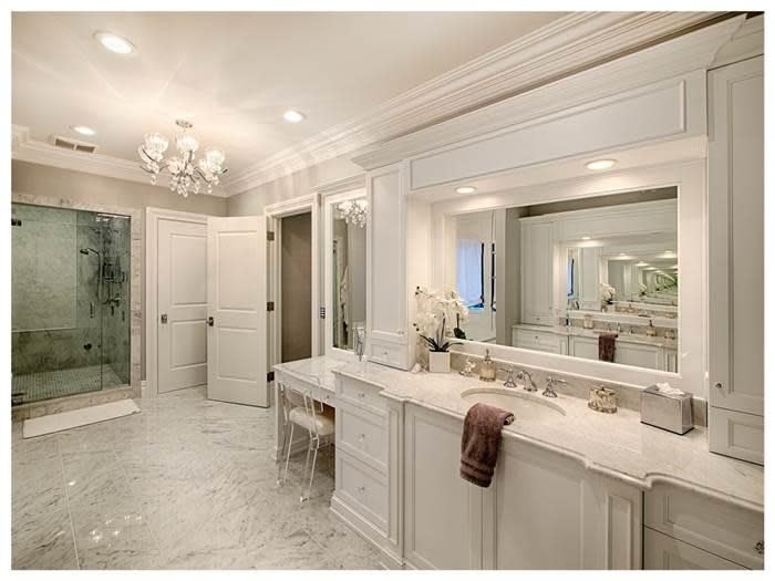 <p>The master-suite features a spa-like style bathroom, that's all white marble.</p><br>