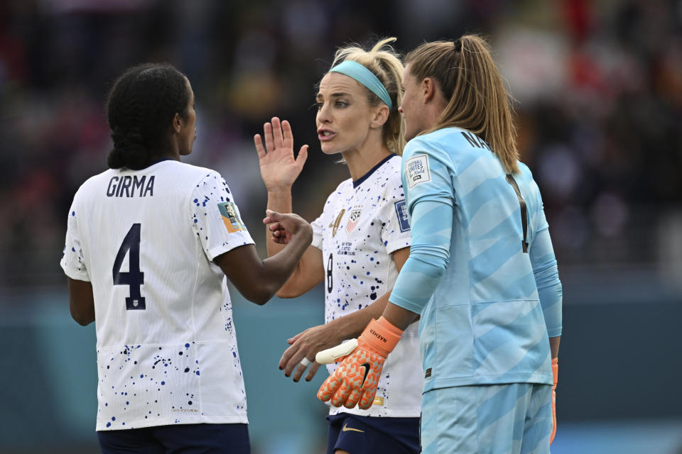 From left, United States' Naomi Girma, United States' Julie Ertz and United States' goalkeeper Alyssa Naeher talk during the Women's World Cup Group E soccer match between the United States and Vietnam at Eden Park in Auckland, New Zealand, Saturday, July 22, 2023. (AP Photo/Andrew Cornaga)