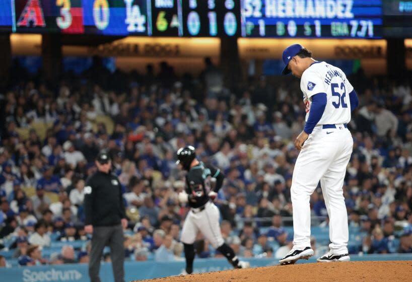 LOS ANGELES, CALIFORNIA May 9, 2024- Dodgers pitcher Elieser Hernandez gives ups a solo home run to Diamondbacks Christian Walker in the sixth inning at Dodger Stadium Wednesday. (Wally Skalij/Los Angeles Times)