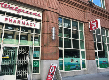 A Walgreens pharmacy door is blocked by a steel gate during a power cut in downtown San Francisco, California, U.S. April 21, 2017. REUTERS/Nigel Manuel